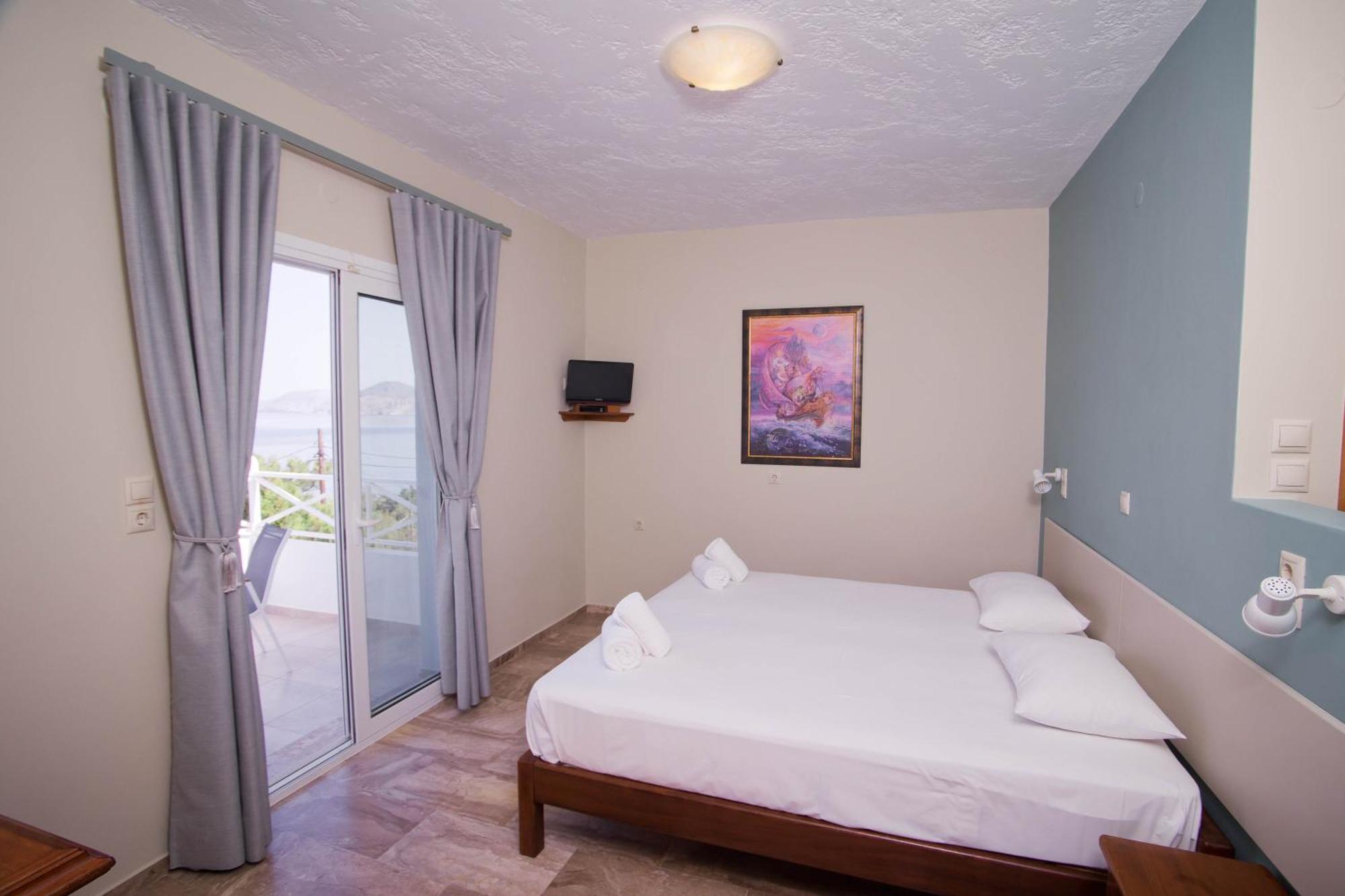 Acropolis Hotel Masouri Bagian luar foto